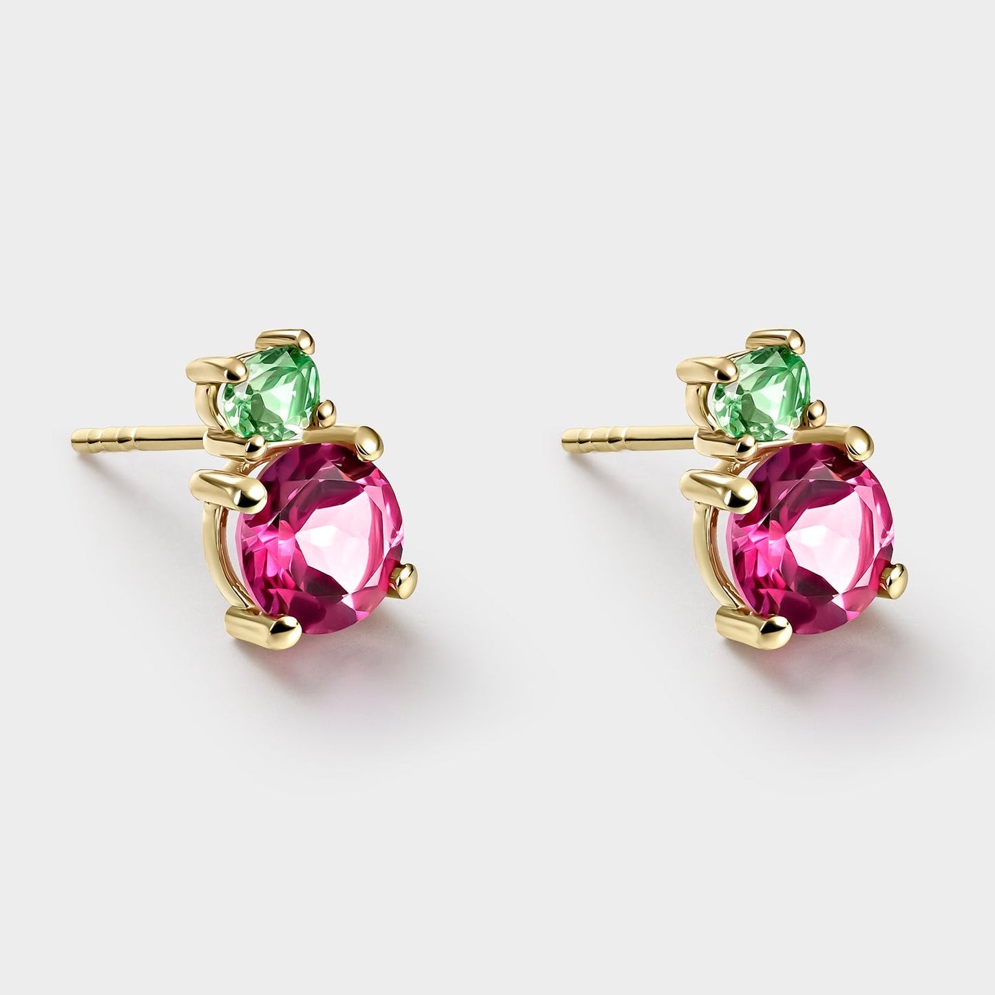 PENDIENTES DE ORO AMARILLO DE 18 KTS CON 2 TOPACIOS ROSAS DE 6MM Y
2 TSAVORITAS OVALES DE 4X3MM
