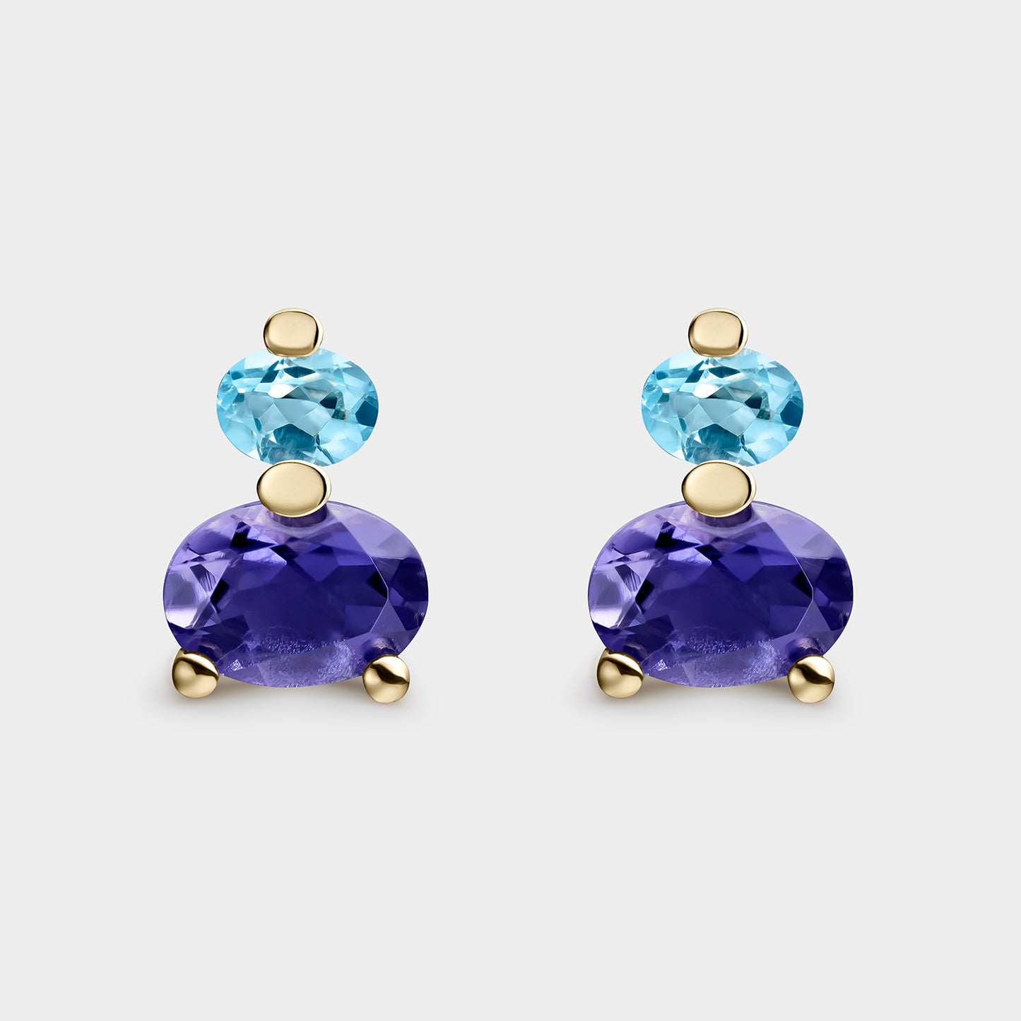 PENDIENTES DE ORO AMARILLO DE 18KTS CON 2 TOPACIOS SWISS OVALES DE 4X3MM Y 2 IOLITAS OVALES DE 7X5MM