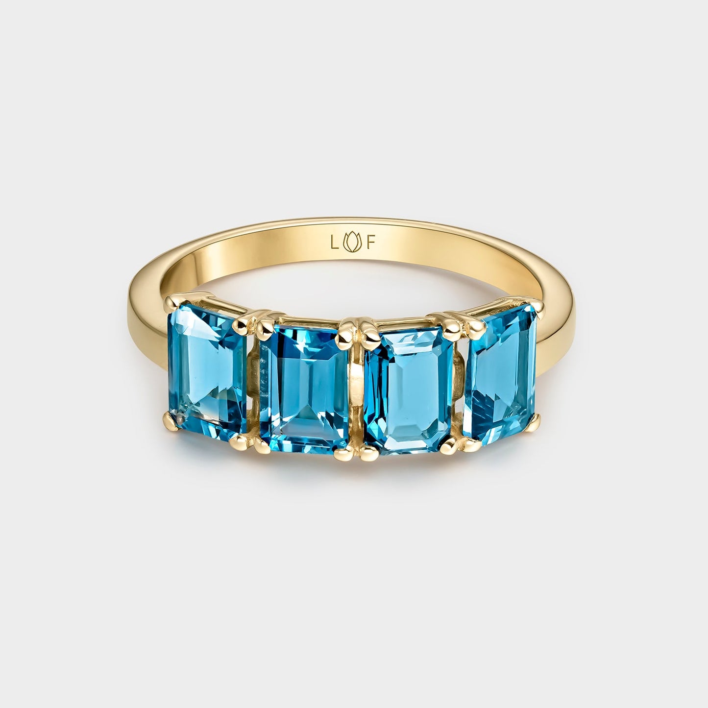 ANILLO ORO AMARILLO DE 18K CON 4 TOPACIOS LONDON BAGUETTE
