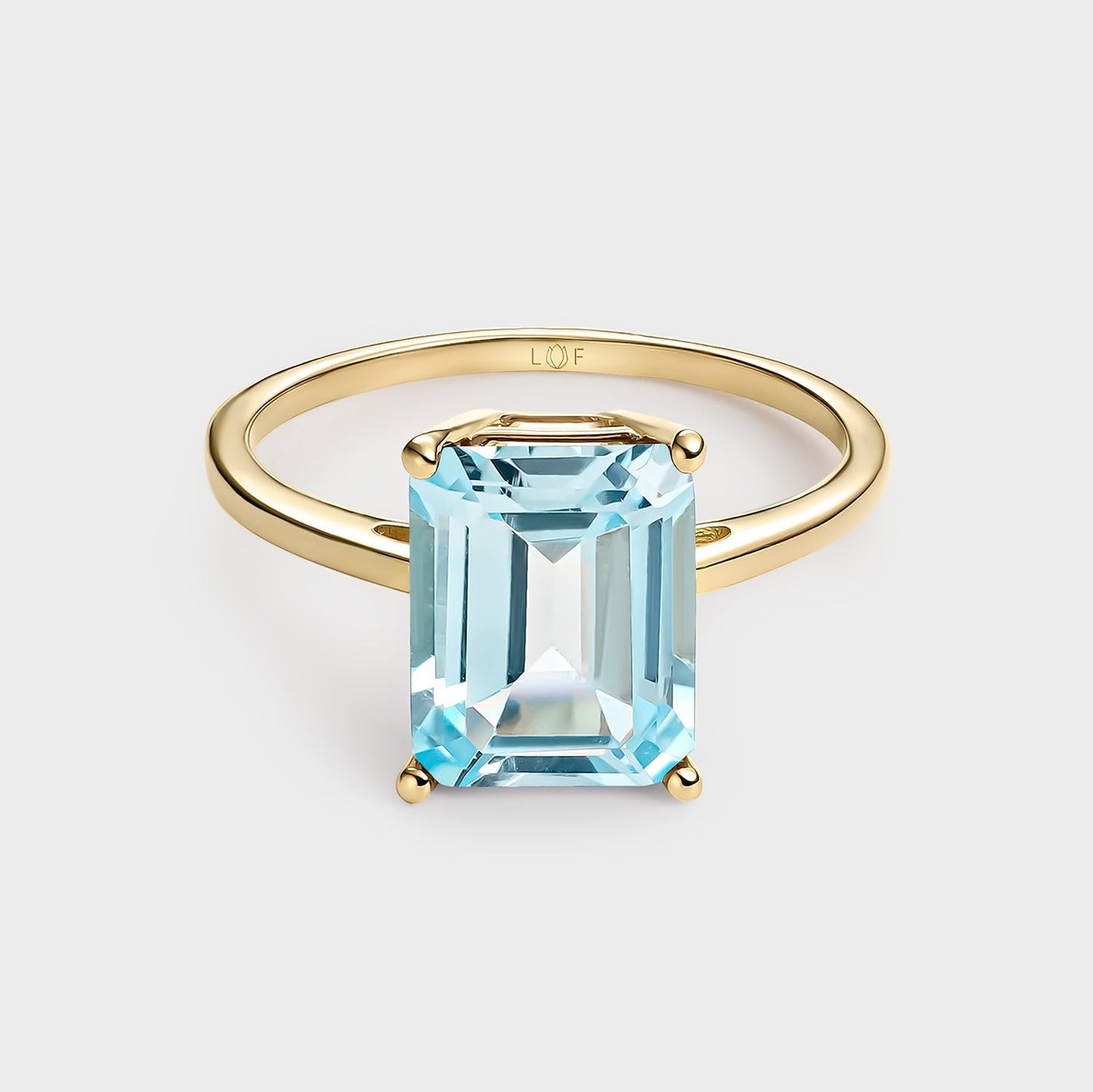 ANILLO TOPACIO OCTOGONAL 10*8
EN ORO DE 18 QUILATES.