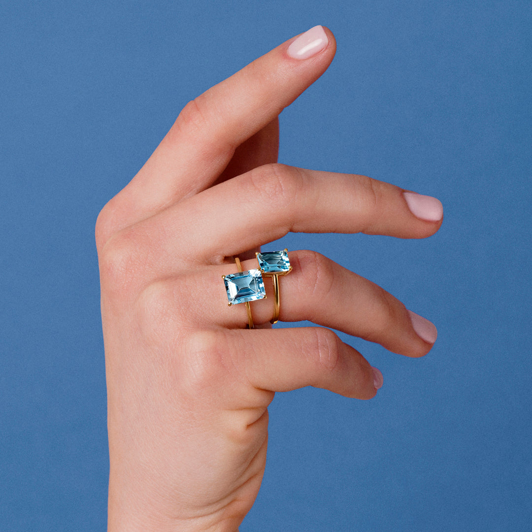 ANILLO ORO AMARILLO 18K TOPACIO AZUL OCTOGONAL PEQ.