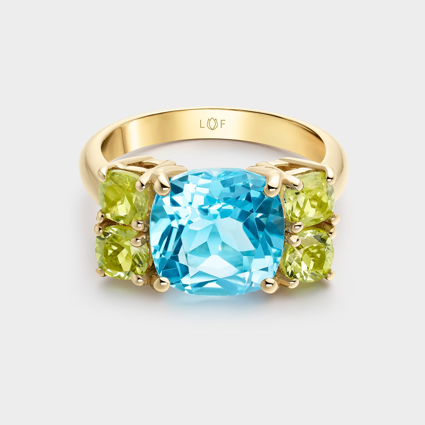 ANILLO ORO AMARILLO 18KTS  TOPACIO SWISS CUSHION Y PERIDOTOS CUSHION