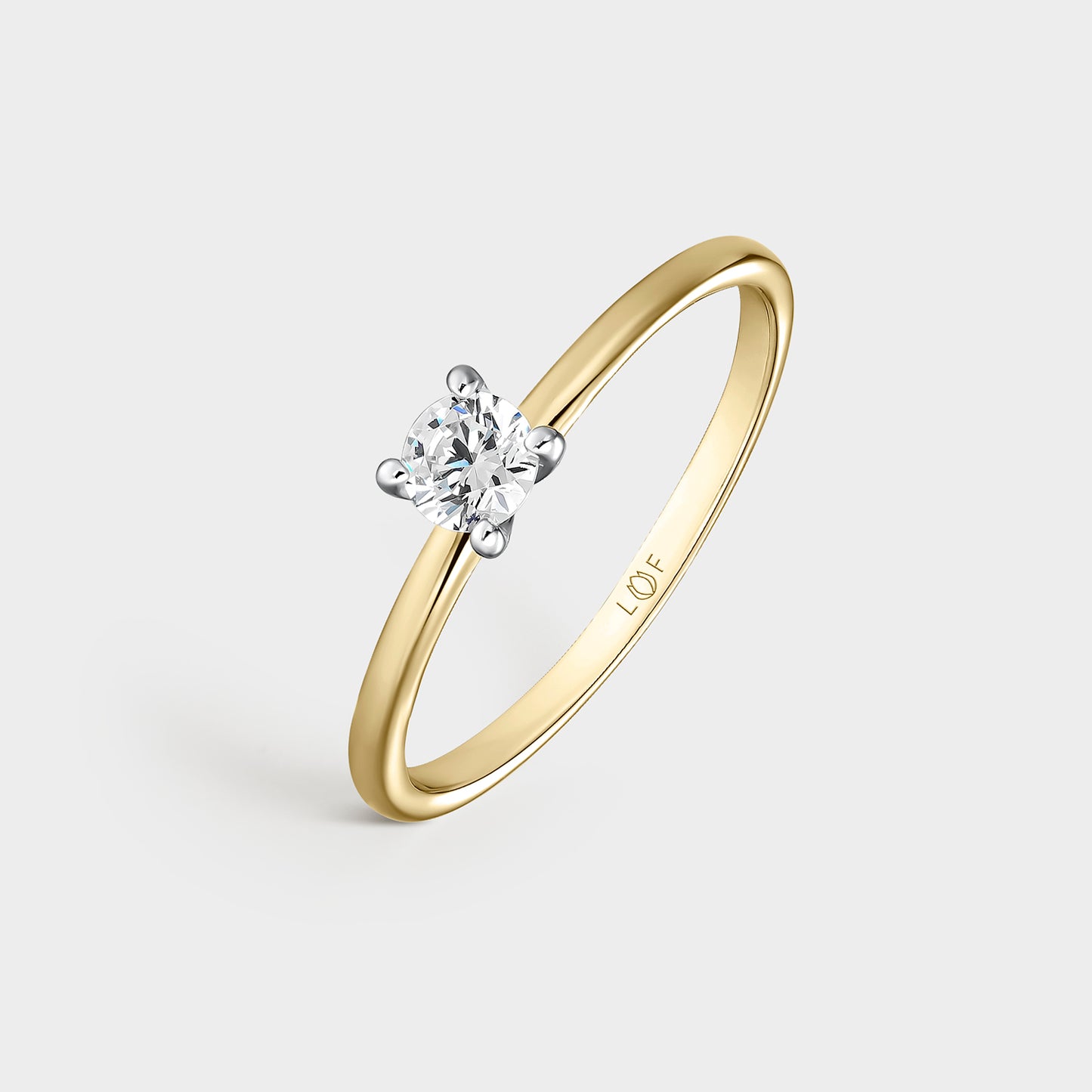 ANILLO SOLITARIO ORO BICOLOR 18K Y DIAMANTE 0,25 CTS